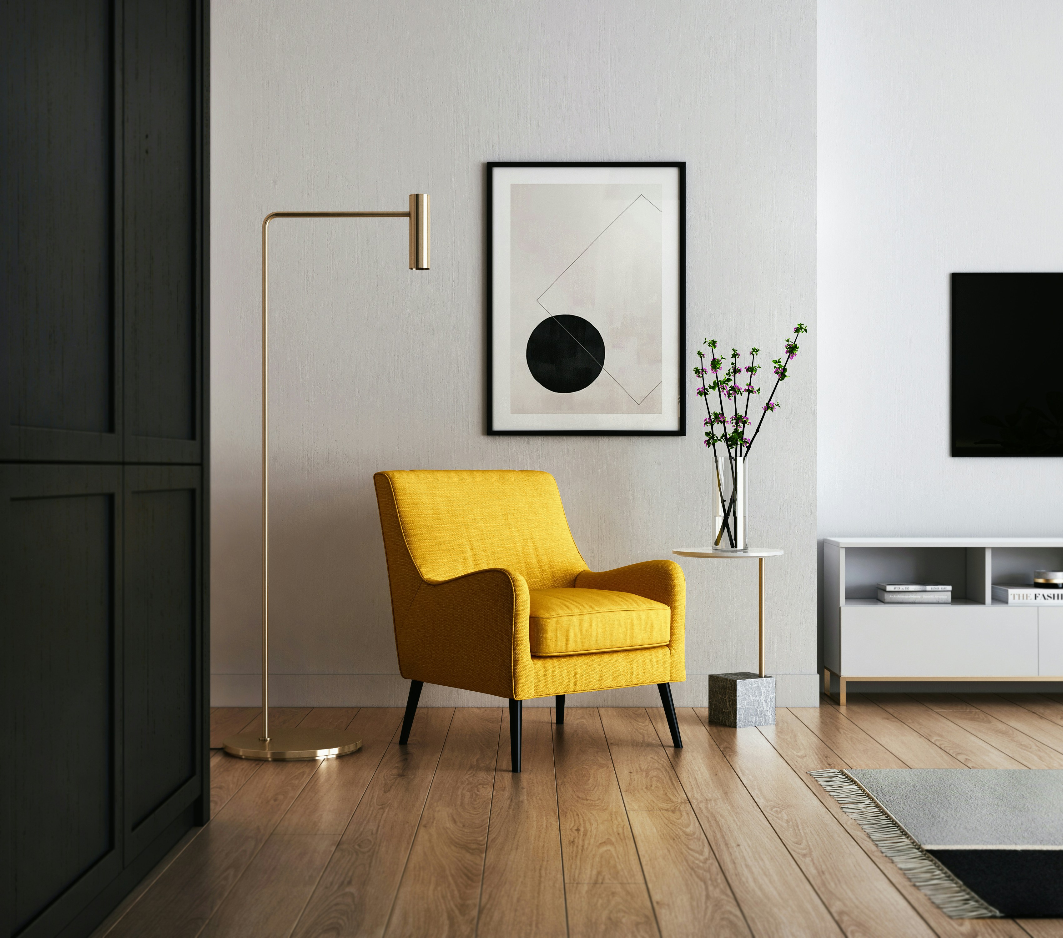 Modern minimalist living room with a yellow armchair and abstract wall art
